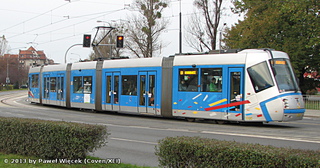 Škoda 19T #3105 na skrzyżowaniu ul.ul. Pięknej i Hubskiej, 2013-11-01